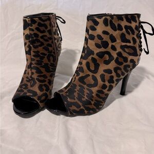 Sugar open toe heeled boots with lace up back in leopard print.
